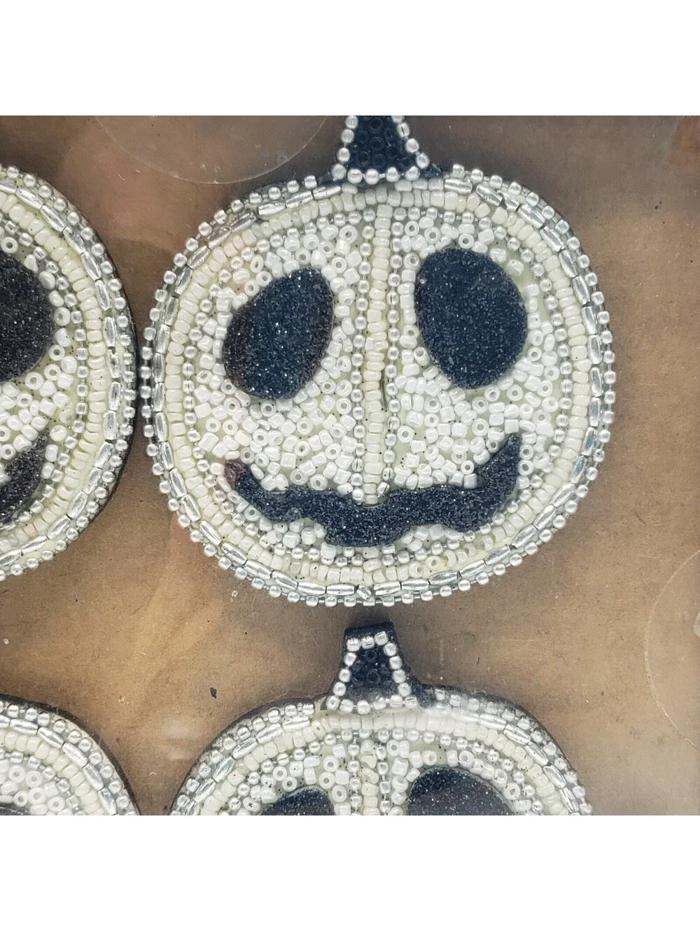 Nicole Miller Home New Pumpkin Head Napkin Ring Holders 4 White Black NIB